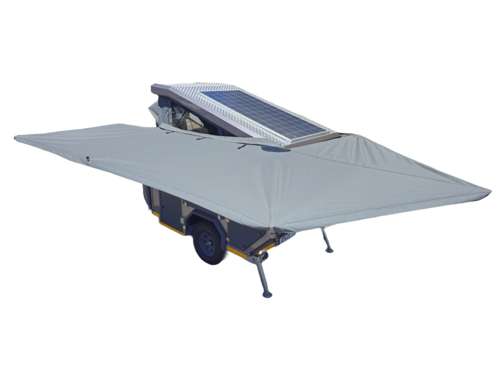 Lunar camper with the 270 degree awning fully extended and the roof-mounted solar panel
